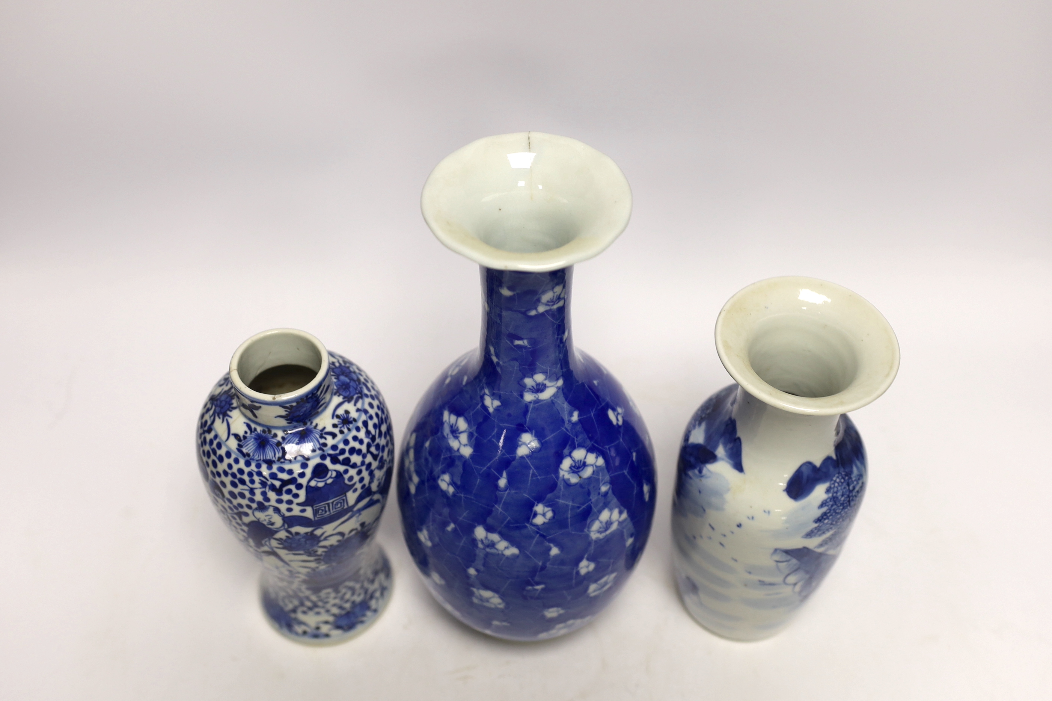 Seven Chinese or Japanese blue and white vases, late 19th/early 20th century, largest 27cm high